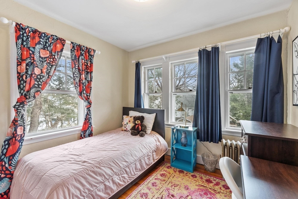 20 Shattuck Street Littleton, MA 01460 - Photo 29 of 41 a bedroom with a large bed and a window