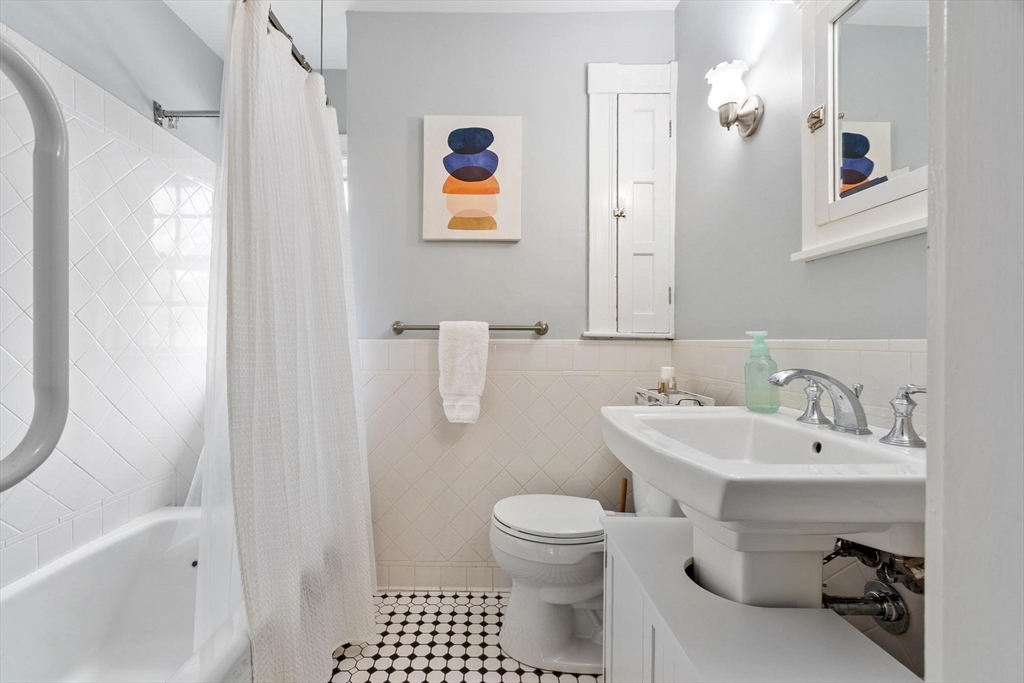 20 Shattuck Street Littleton, MA 01460 - Photo 31 of 41 a bathroom with a sink toilet and shower