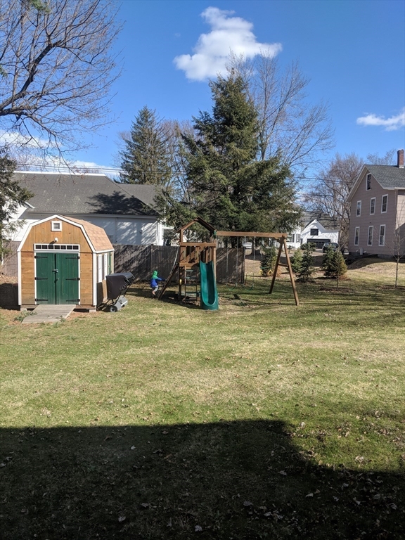 20 Shattuck Street Littleton, MA 01460 - Photo 38 of 41 a view of a garden with a bench
