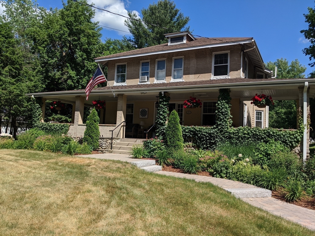 20 Shattuck Street Littleton, MA 01460 - Photo 4 of 41 a front view of a house with garden