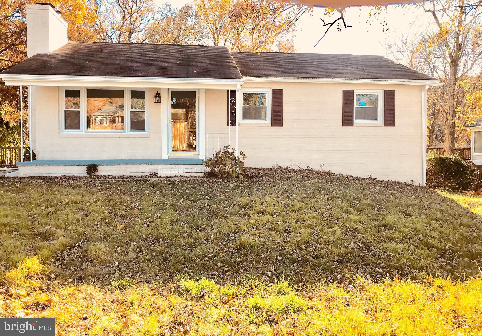 1335 Ava Road Severn, MD 21144 - Photo 1 of 13 a front view of a house with a yard
