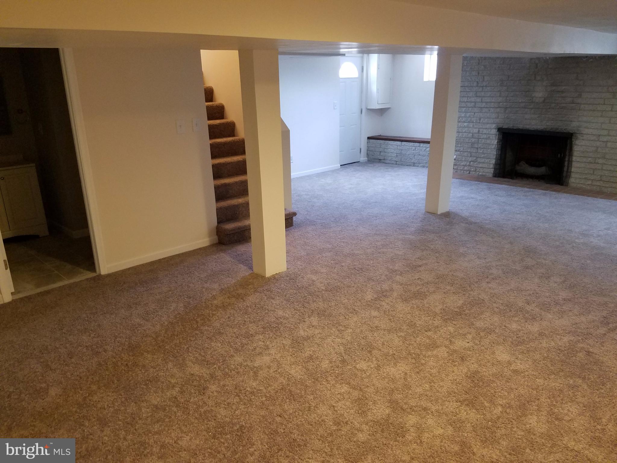 1335 Ava Road Severn, MD 21144 - Photo 12 of 13 a view of an empty room with a fireplace