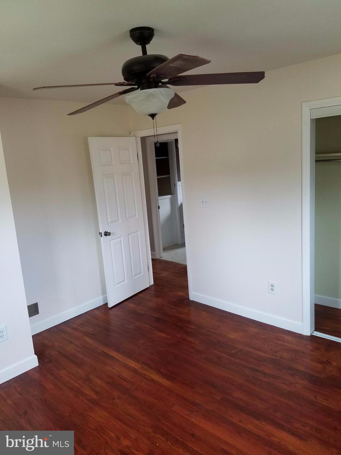 1335 Ava Road Severn, MD 21144 - Photo 8 of 13 a view of empty room with wooden floor