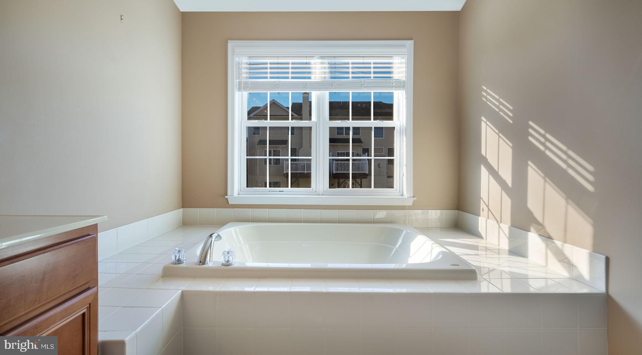 2372 Dorchester Street West, Unit W Furlong, PA 18925 - Photo 28 of 41 a view of a bath tub sitting in a bathroom