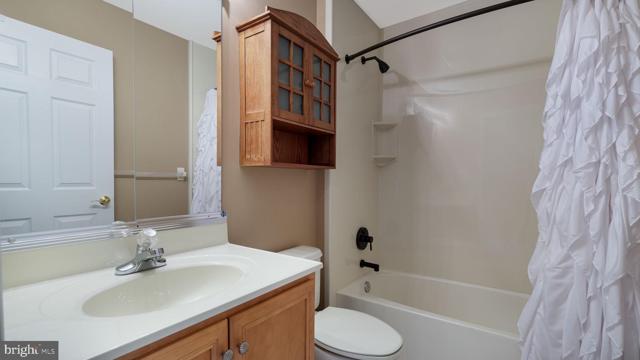 2372 Dorchester Street West, Unit W Furlong, PA 18925 - Photo 33 of 41 a bathroom with a sink toilet and shower
