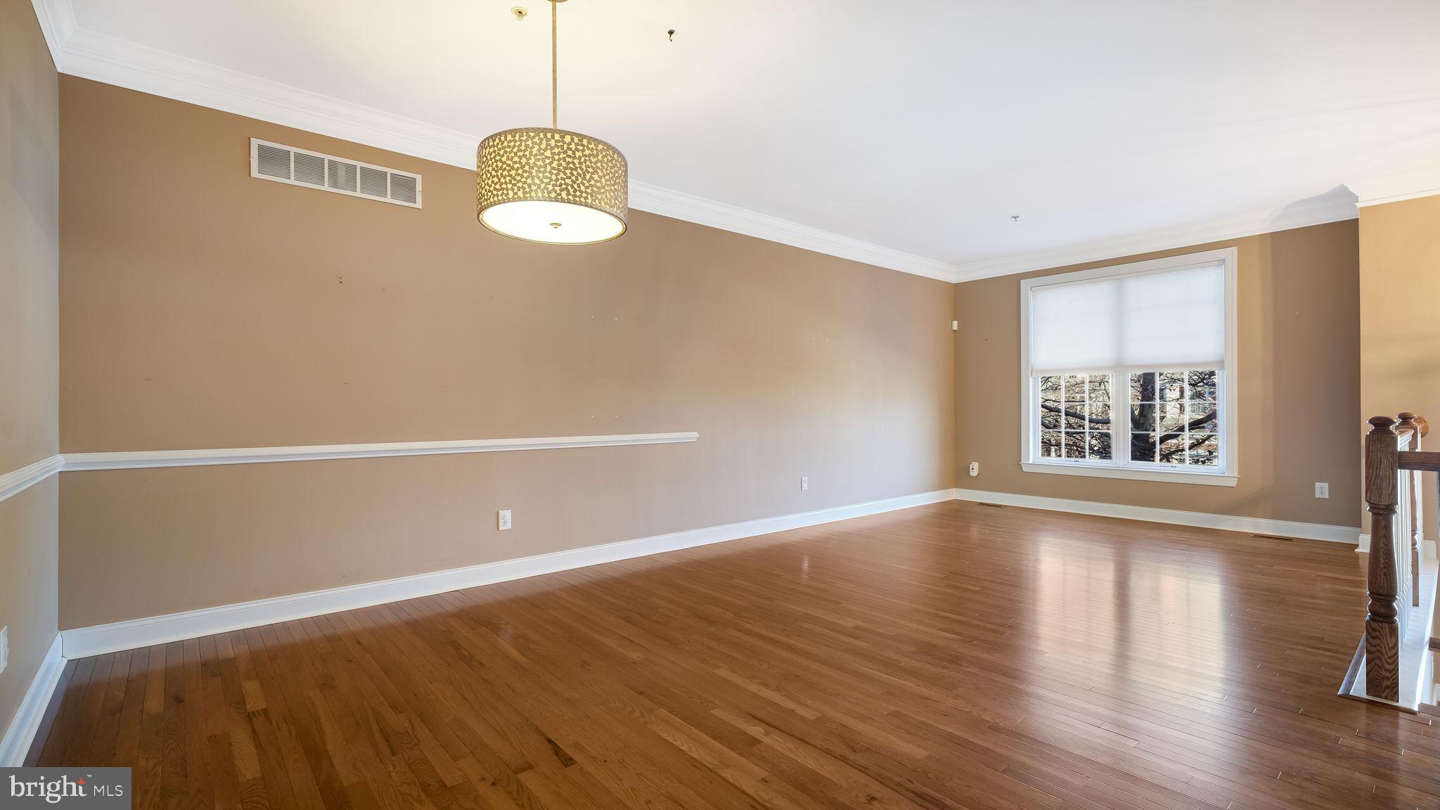 2372 Dorchester Street West, Unit W Furlong, PA 18925 - Photo 8 of 41 a view of a room with wooden floor and window