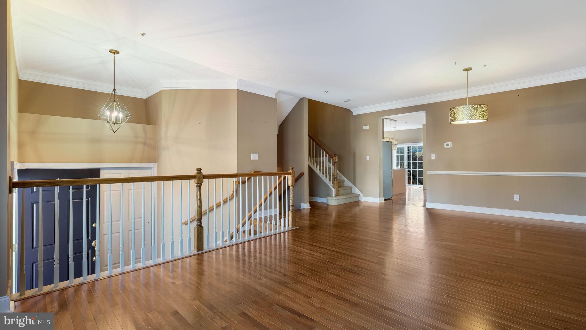 2372 Dorchester Street West, Unit W Furlong, PA 18925 - Photo 9 of 41 a view of a hallway with wooden floor