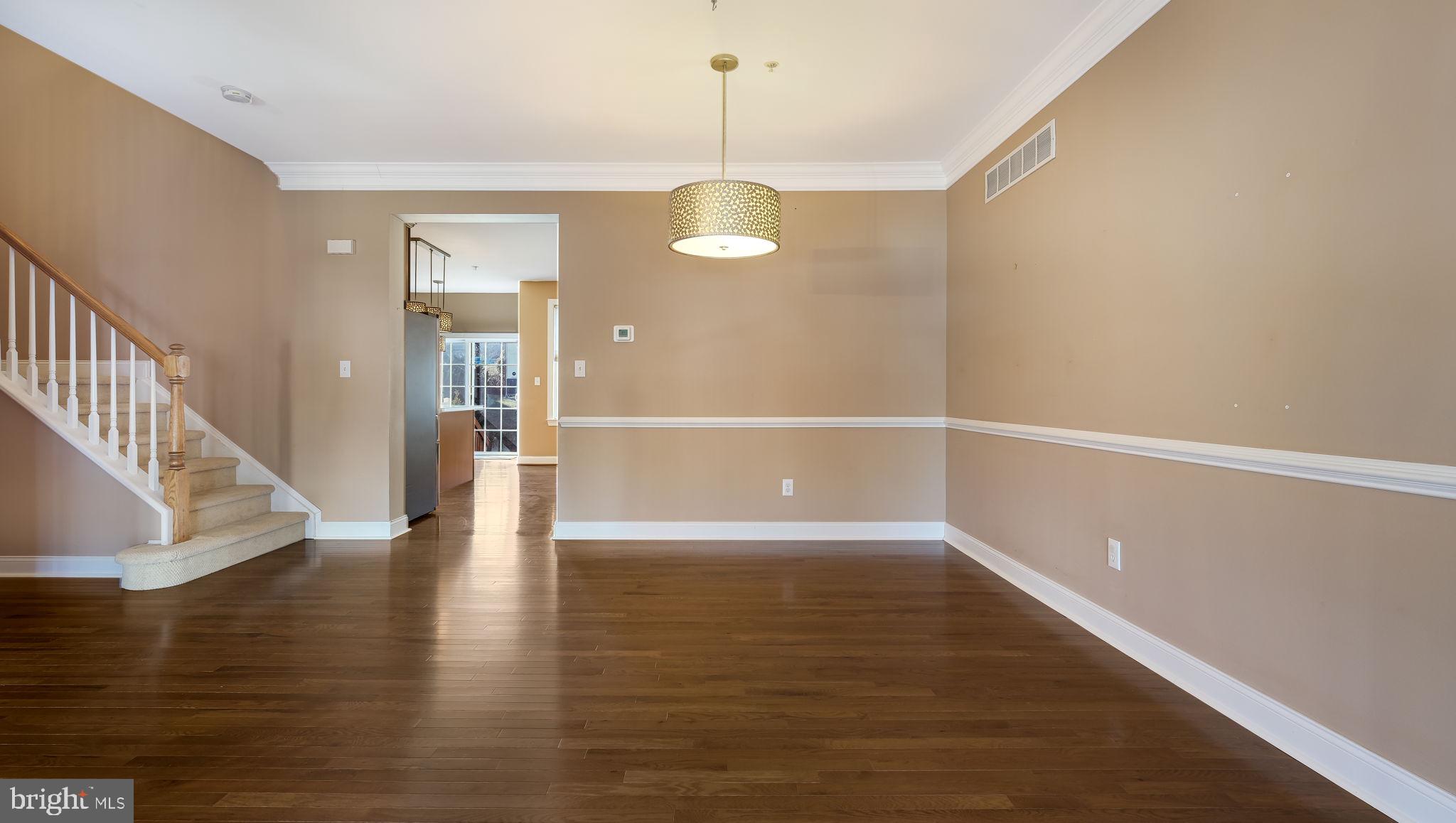 2372 Dorchester Street West, Unit W Furlong, PA 18925 - Photo 10 of 41 a view of an entryway with wooden floor