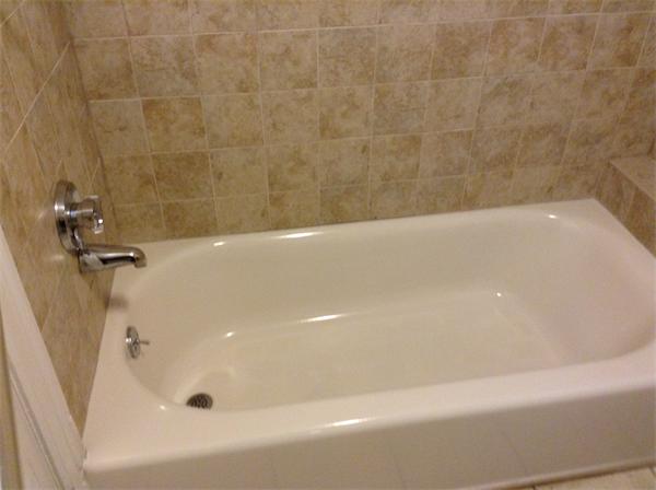 55 High Street Needham, MA 02494 - Photo 13 of 15 a bathroom with a bathtub