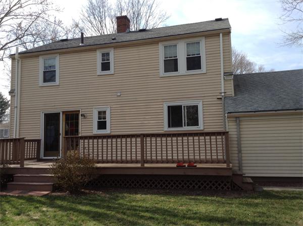 55 High Street Needham, MA 02494 - Photo 14 of 15 a view of a house with a yard