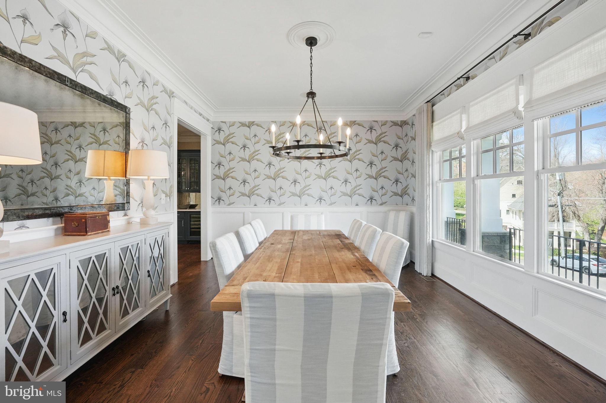 6645 Byrns Place McLean, VA 22101 - Photo 11 of 64 a view of a dining room with furniture wooden floor and chandelier