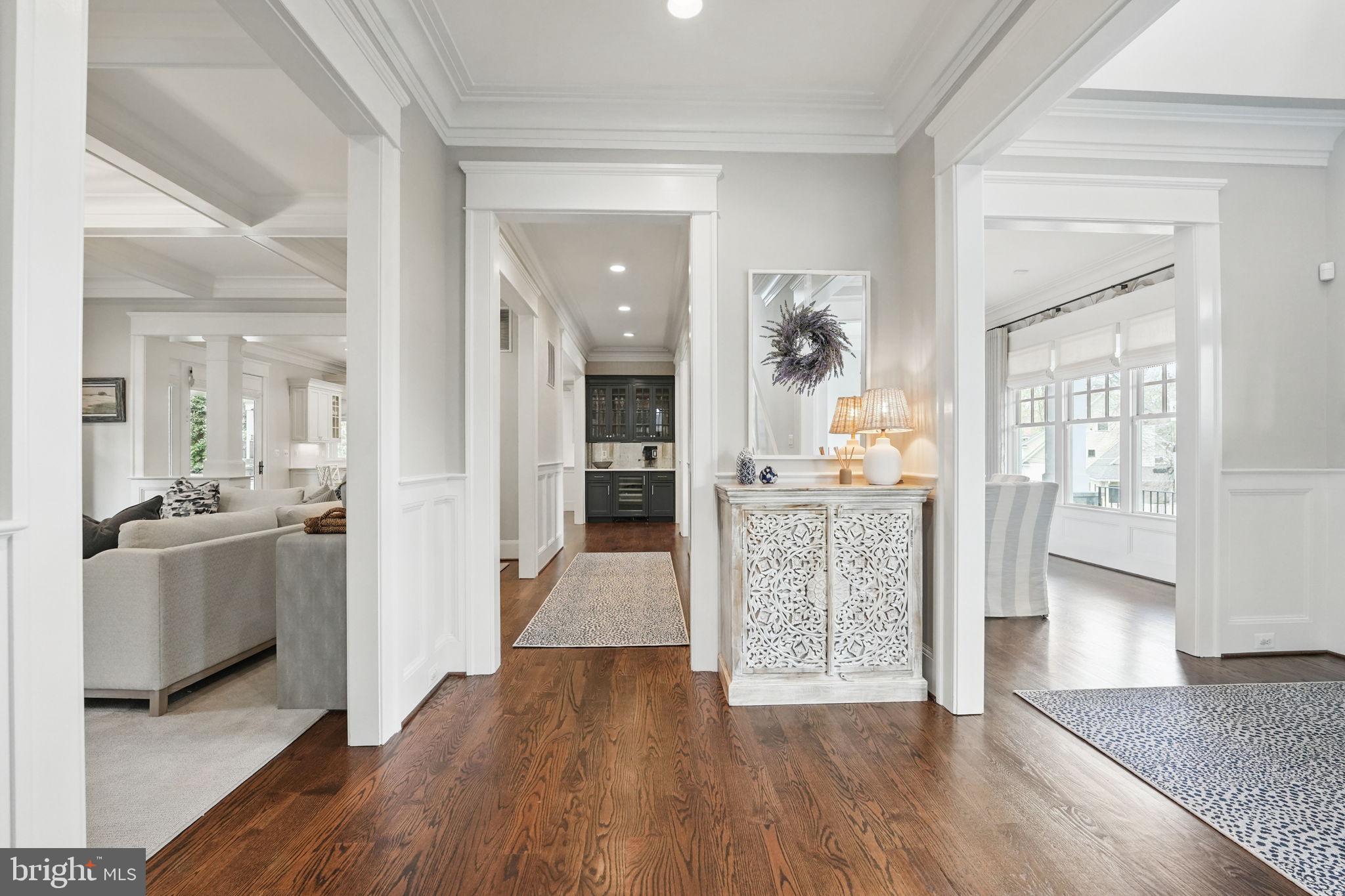 6645 Byrns Place McLean, VA 22101 - Photo 14 of 64 a view of a kitchen and an entryway with wooden floor and a kitchen