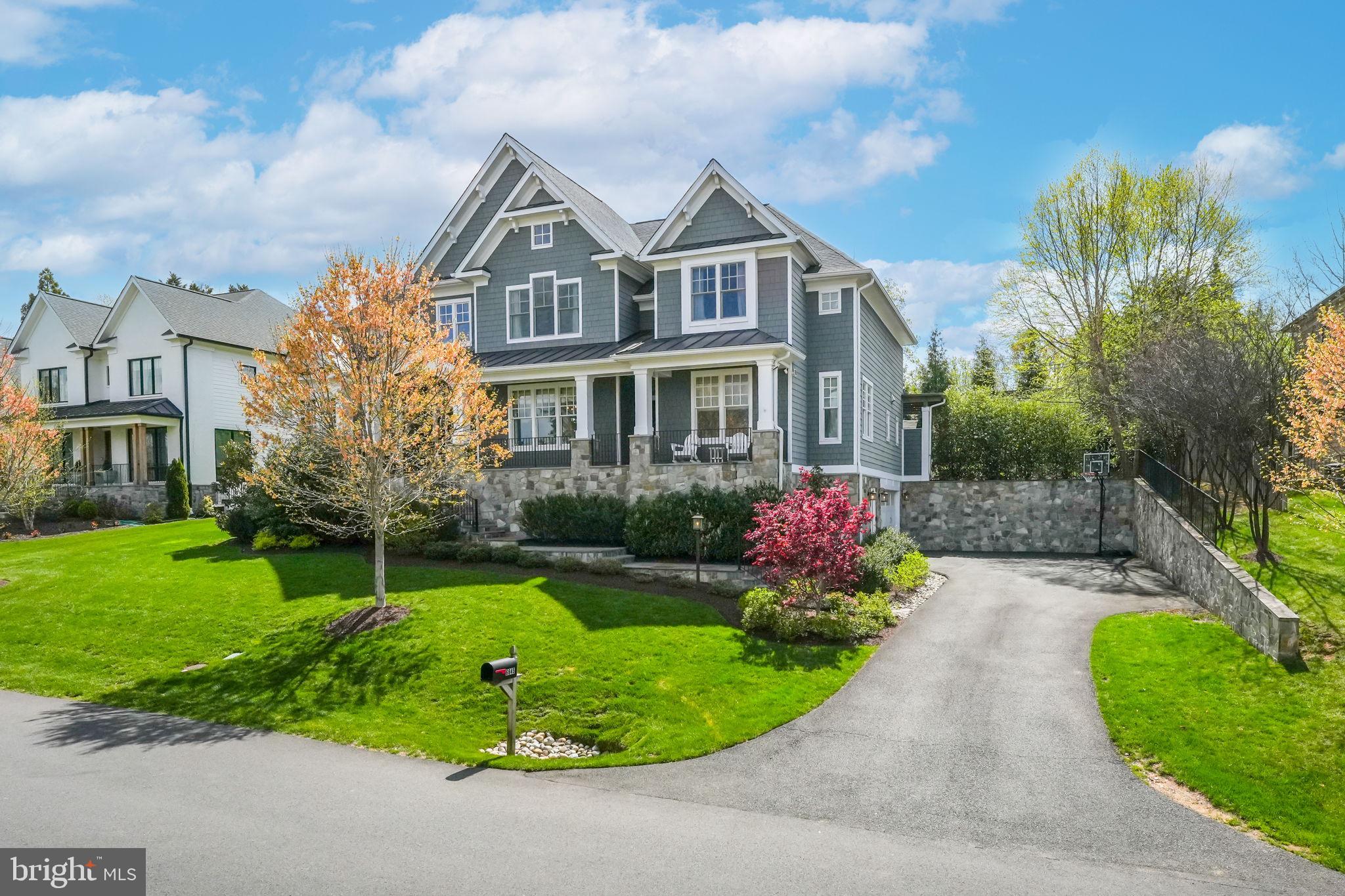 6645 Byrns Place McLean, VA 22101 - Photo 2 of 64 a front view of house with yard and green space