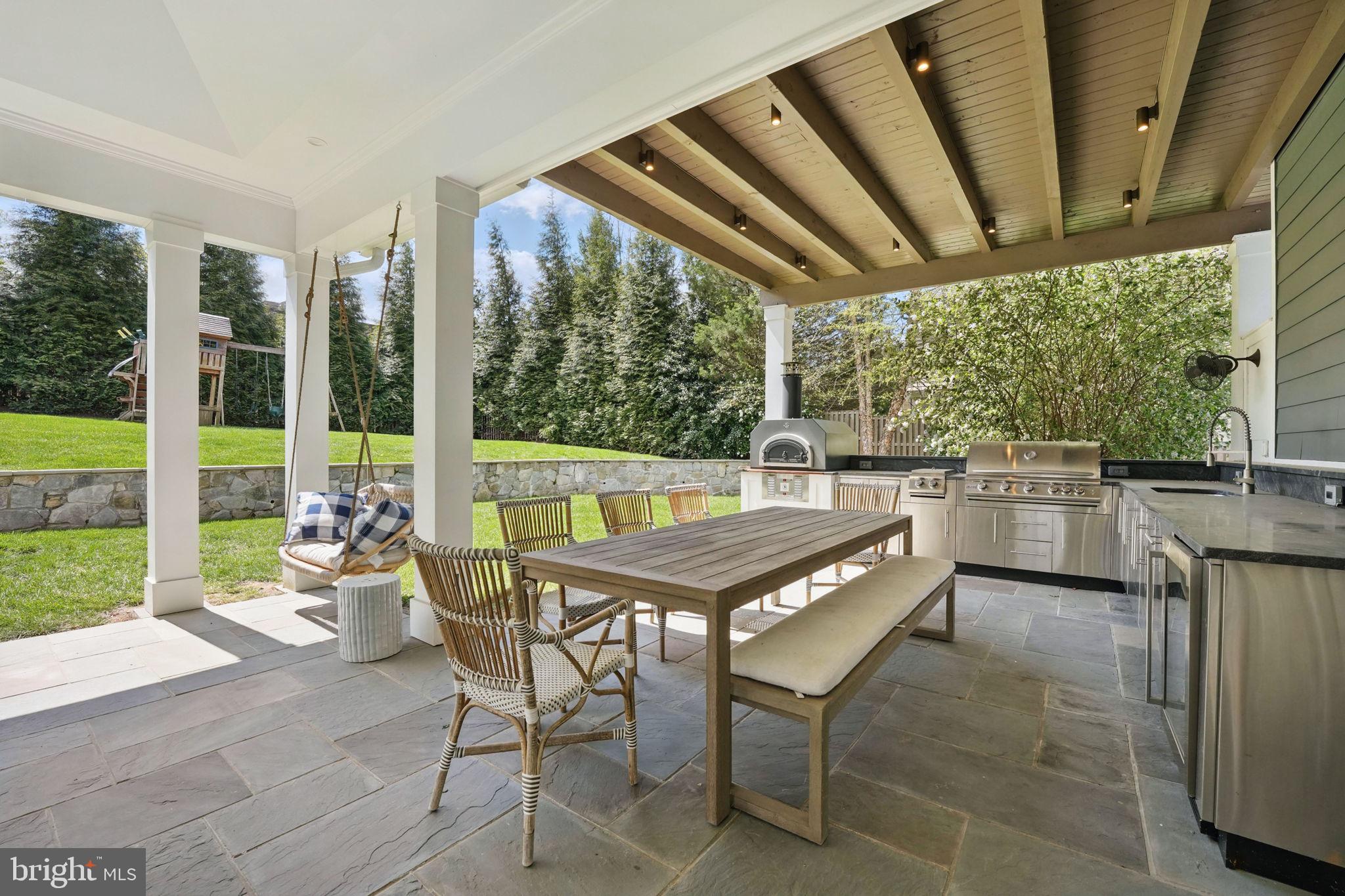 6645 Byrns Place McLean, VA 22101 - Photo 27 of 64 a outdoor dining space with furniture and garden view