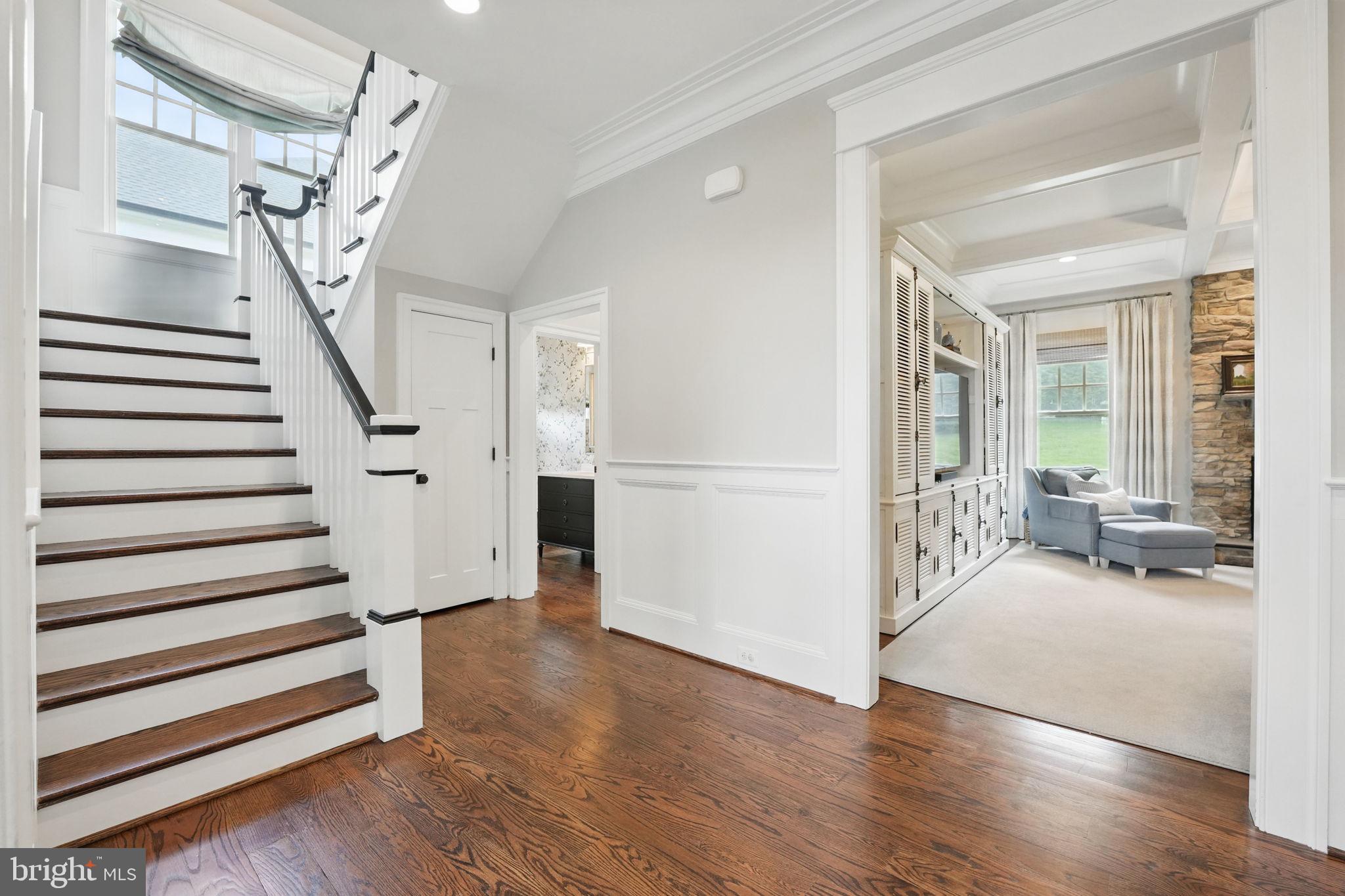 6645 Byrns Place McLean, VA 22101 - Photo 29 of 64 a view of a livingroom with wooden floor and stairs