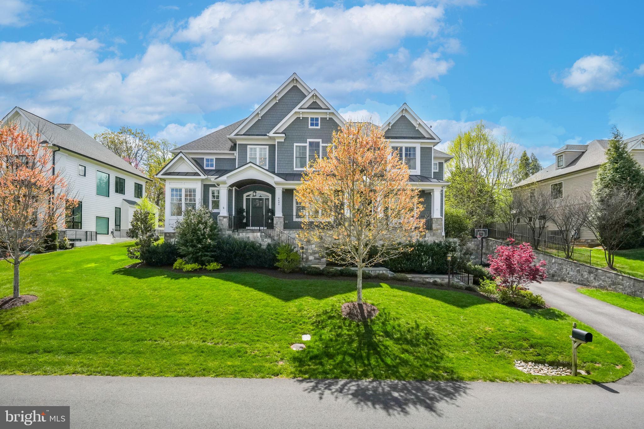 6645 Byrns Place McLean, VA 22101 - Photo 3 of 64 a front view of a house with garden
