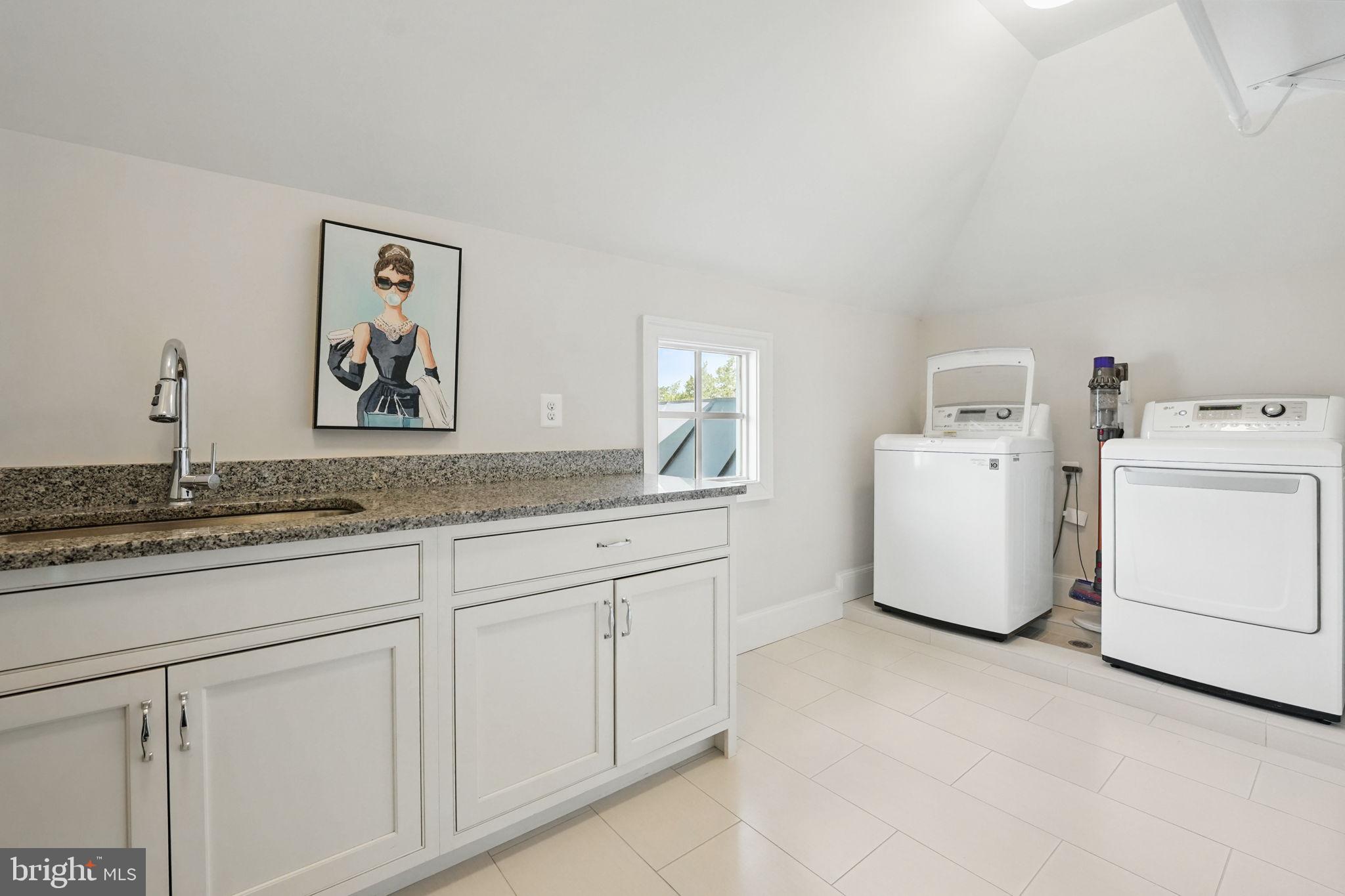 6645 Byrns Place McLean, VA 22101 - Photo 31 of 64 a utility room with closet dryer and washer