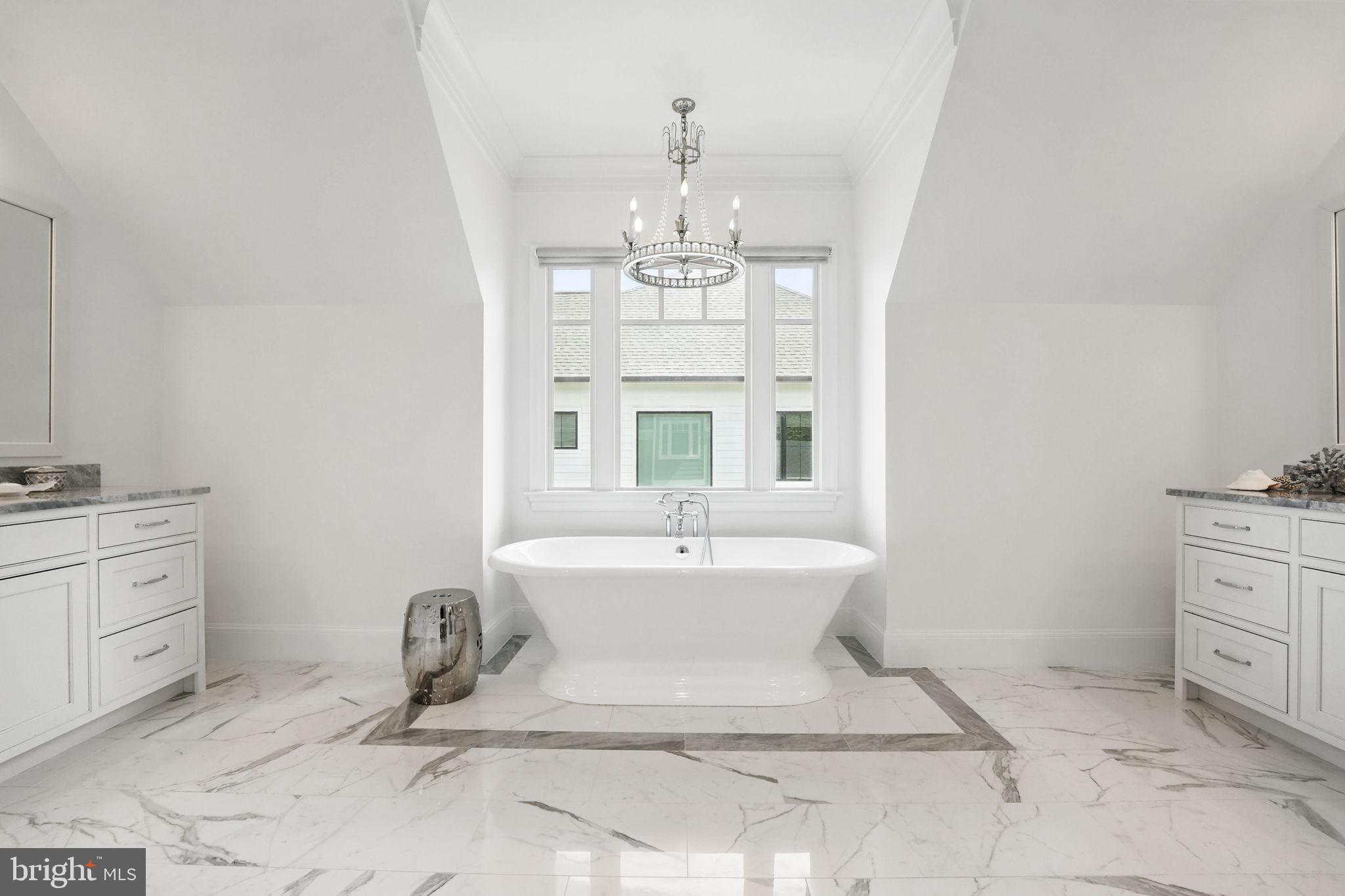 6645 Byrns Place McLean, VA 22101 - Photo 34 of 64 a bathroom with a sink mirror and window