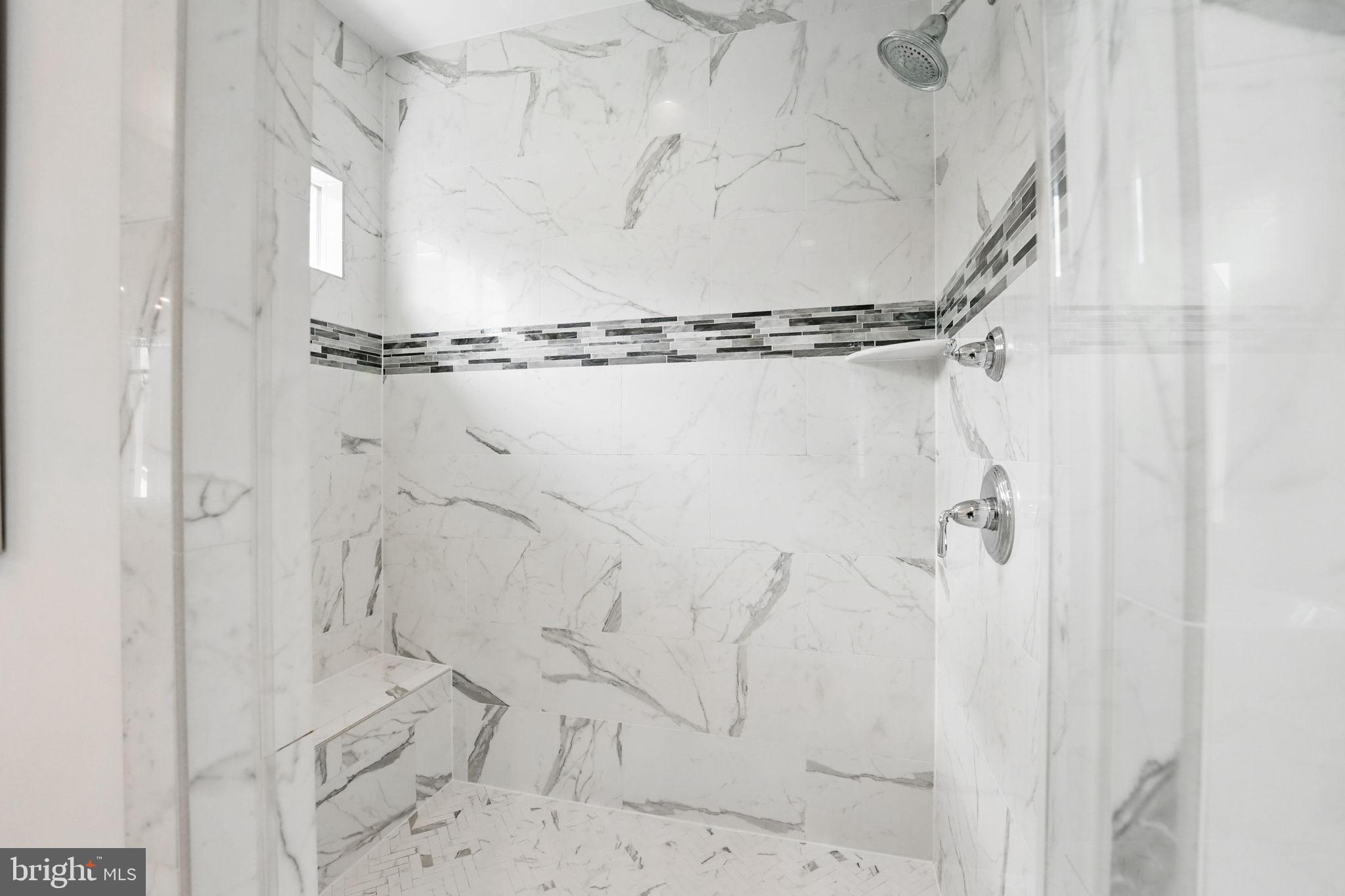 6645 Byrns Place McLean, VA 22101 - Photo 37 of 64 a bathroom with a shower