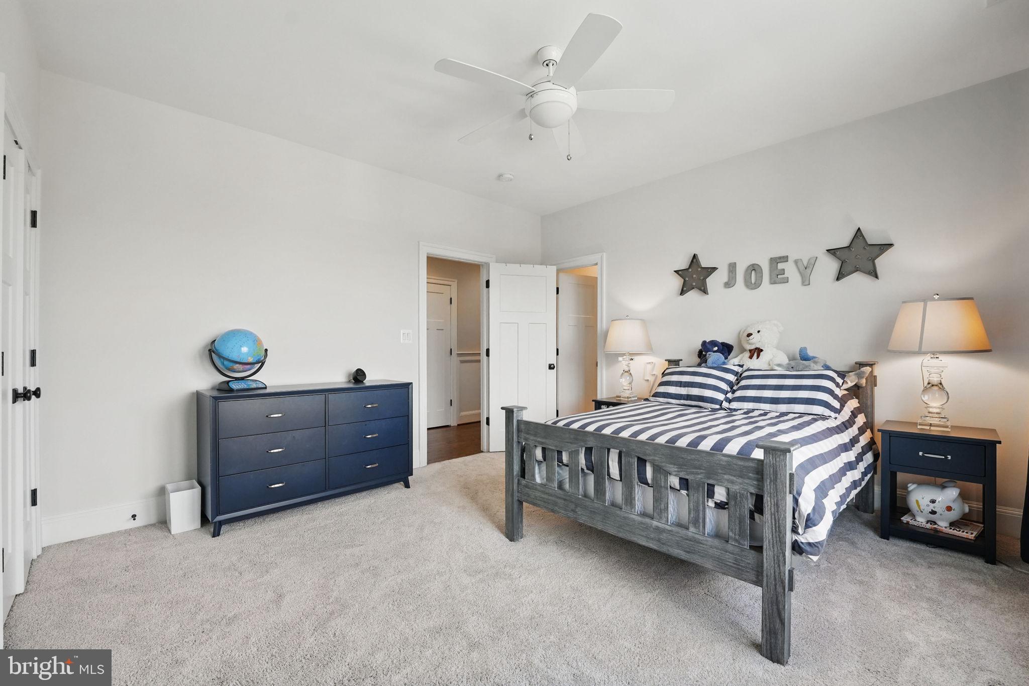 6645 Byrns Place McLean, VA 22101 - Photo 38 of 64 a bedroom with a bed and a table