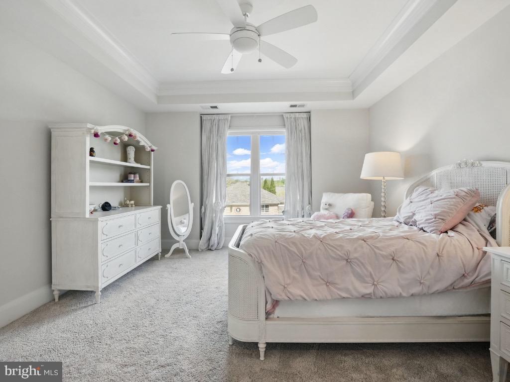 6645 Byrns Place McLean, VA 22101 - Photo 41 of 64 a spacious bedroom with a bed and a window