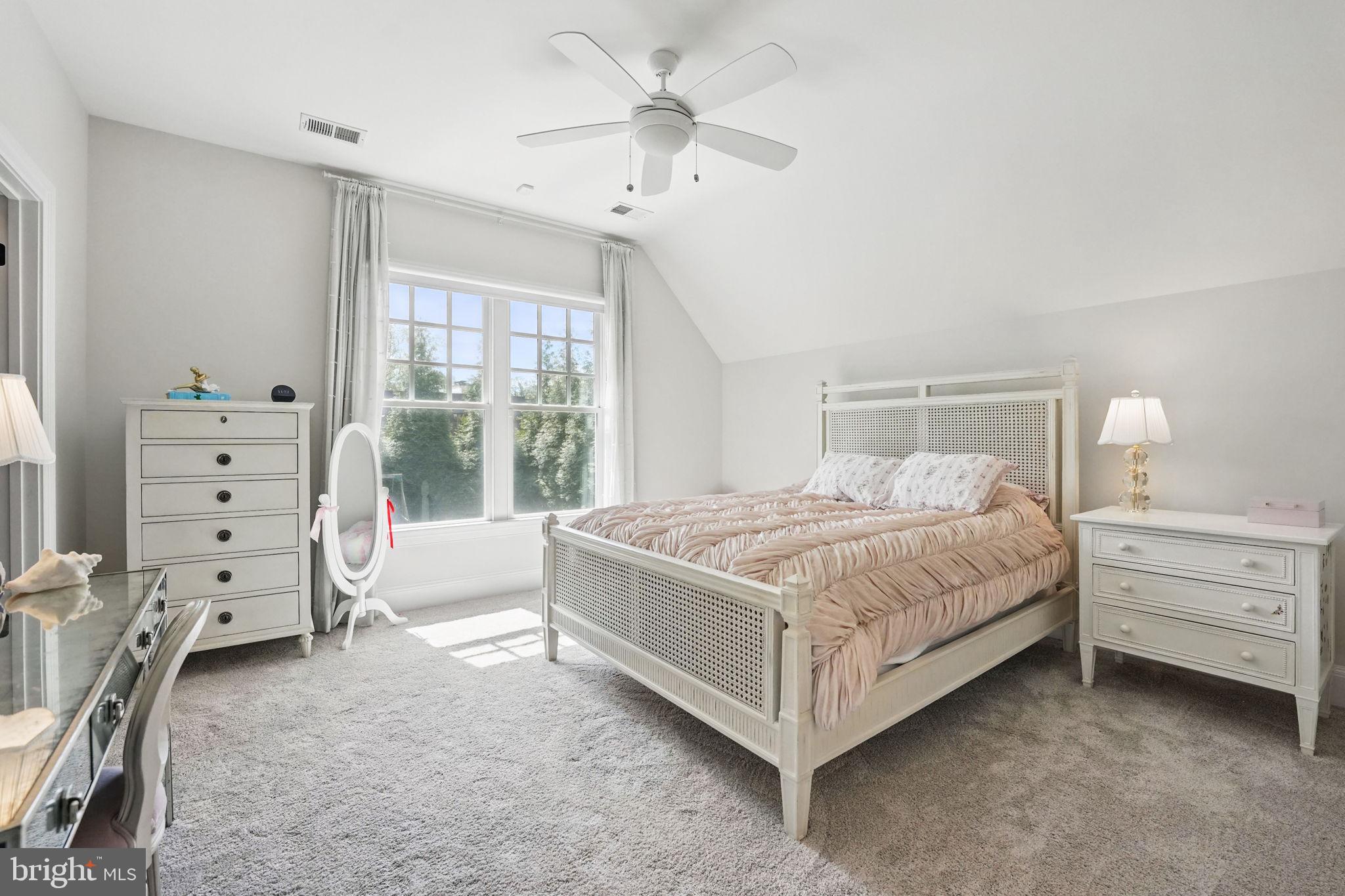 6645 Byrns Place McLean, VA 22101 - Photo 43 of 64 a bedroom with a bed and a dresser