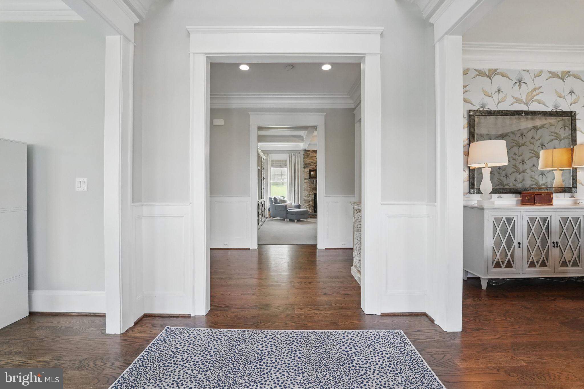 6645 Byrns Place McLean, VA 22101 - Photo 5 of 64 a view of a hallway with wooden floor and a rug