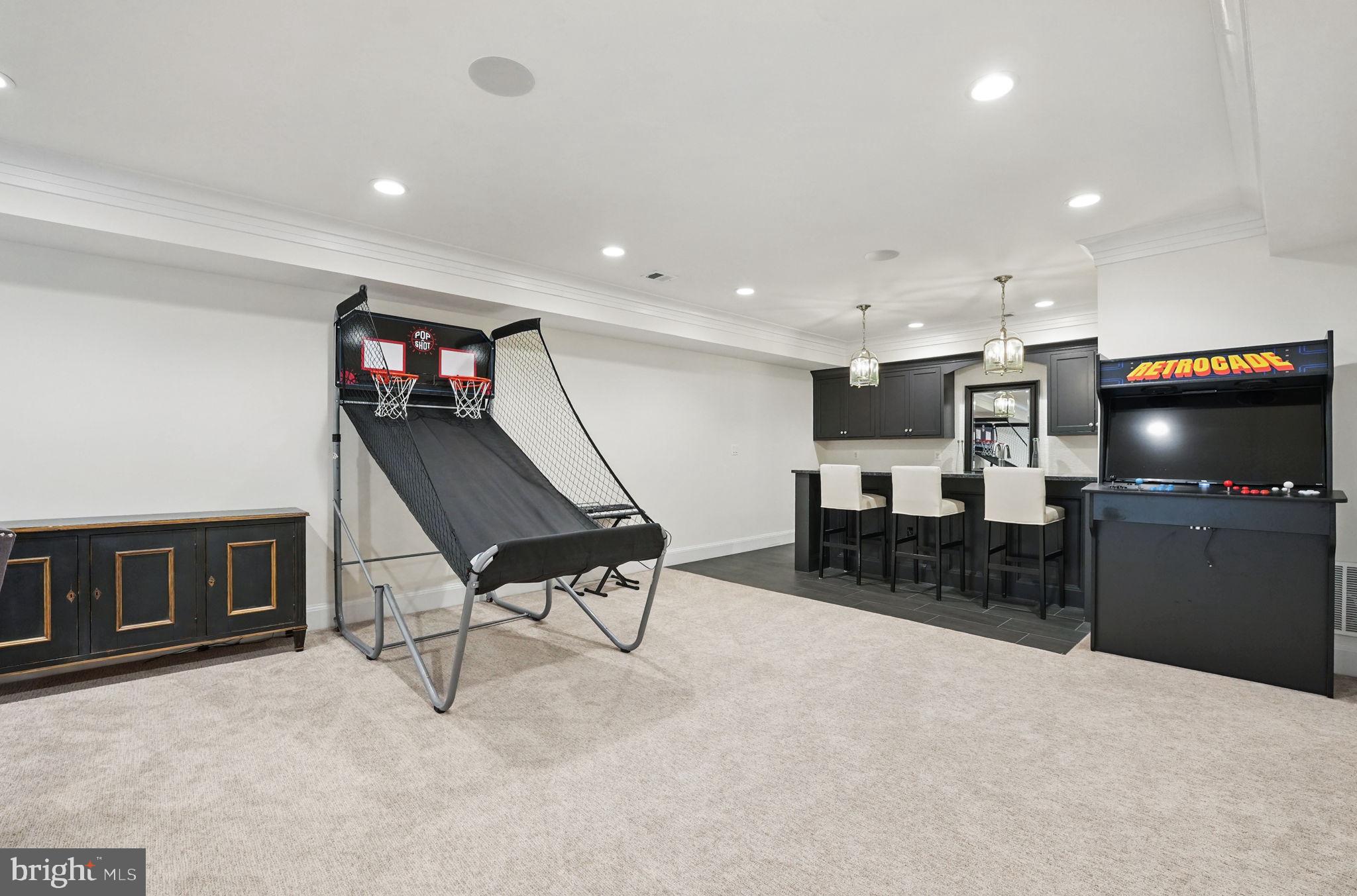 6645 Byrns Place McLean, VA 22101 - Photo 53 of 64 a living room with furniture and a flat screen tv