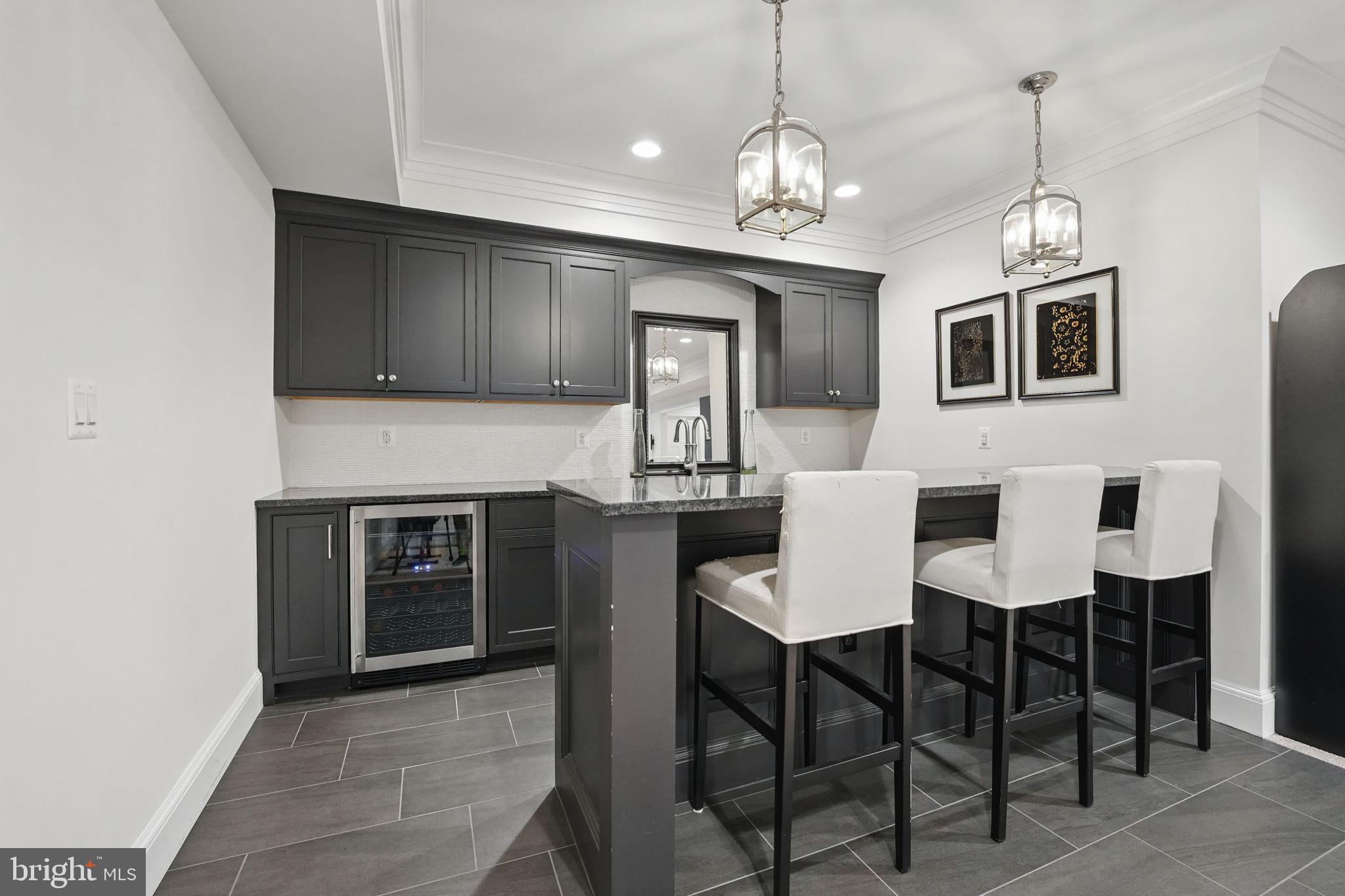 6645 Byrns Place McLean, VA 22101 - Photo 54 of 64 a view of a dining room with furniture and chandelier