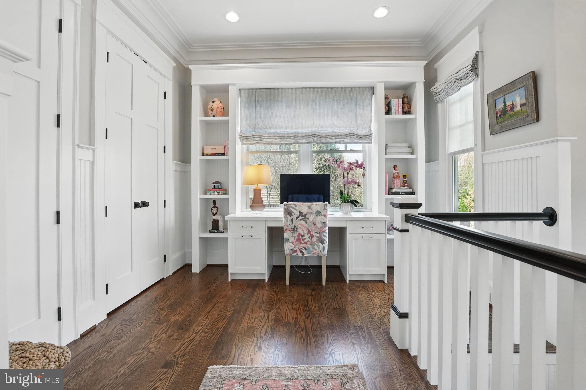 6645 Byrns Place McLean, VA 22101 - Photo 59 of 64 a living room with furniture wooden floor and a flat screen tv