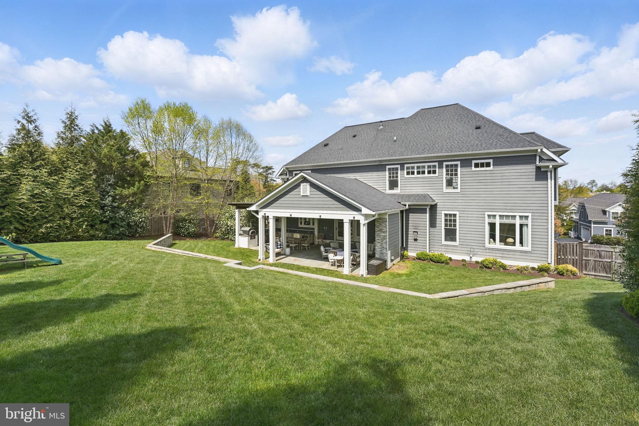 6645 Byrns Place McLean, VA 22101 - Photo 64 of 64 a front view of a house with a yard