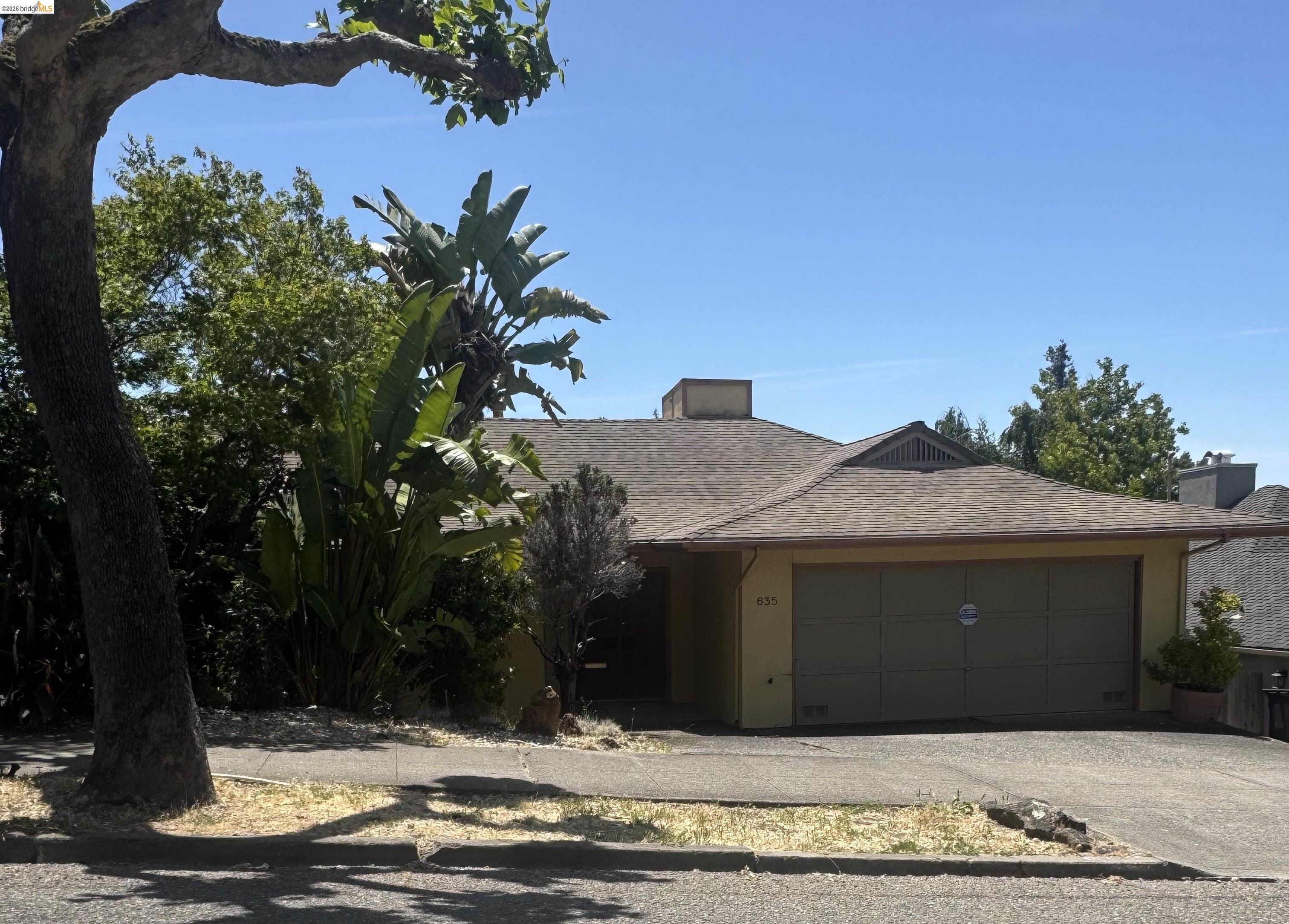 635 Longridge Road Oakland, CA 94610 - Photo 1 of 1 a front view of a house with windows