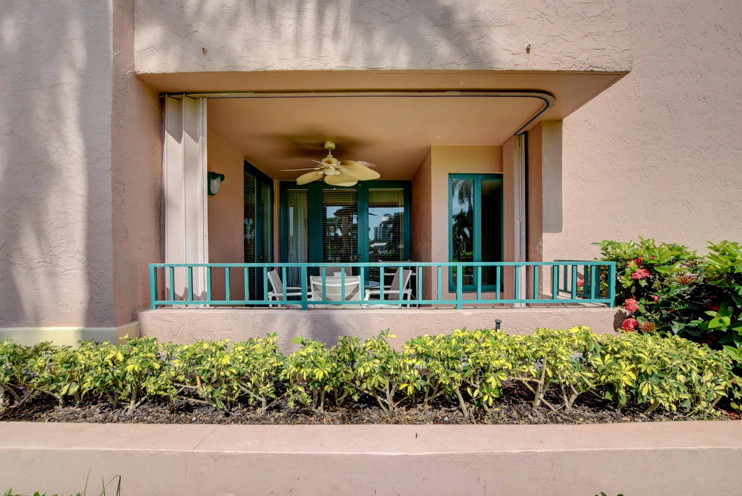 140 Southeast 5th Avenue, Unit 239 Boca Raton, FL 33432 - Photo 37 of 68 Back of Condo M/BR Covered Patio