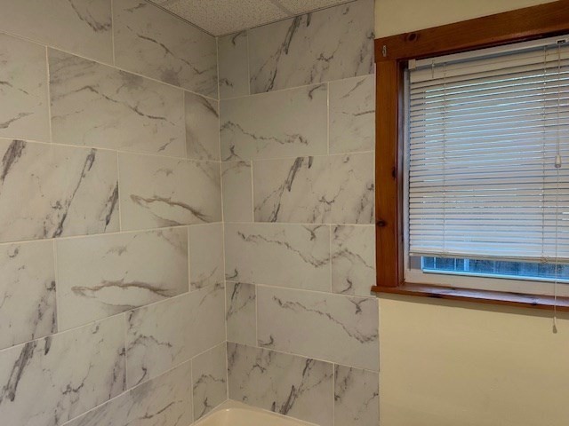 34 Perkins Street, Unit 1 Gloucester, MA 01930 - Photo 6 of 14 a bathroom with a shower