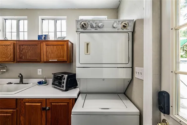a utility room with dryer and washer
