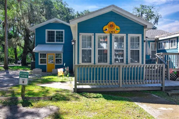 a front view of a house with swimming pool