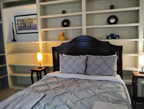 a bedroom with a bed and closet