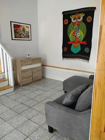 a living room with a couch and a coffee table