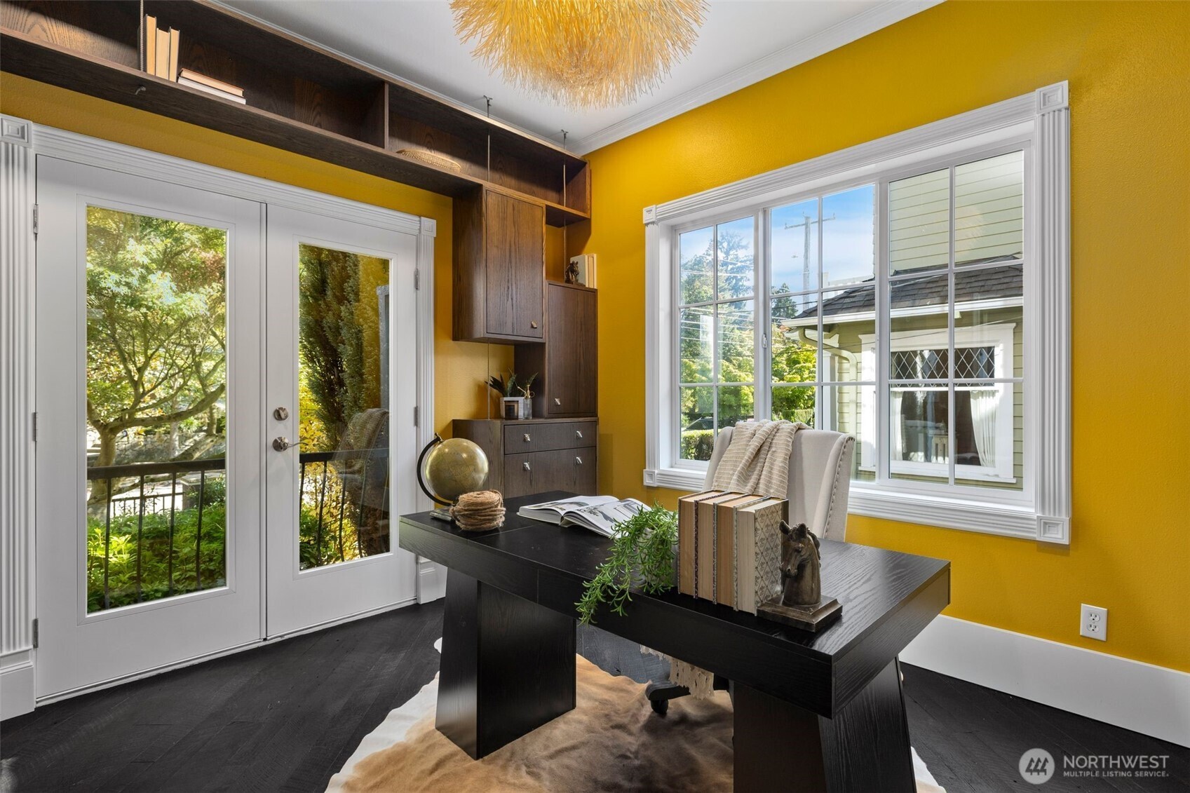 1147 Federal Avenue East Seattle, WA 98102 - Photo 16 of 40 a view of a workspace with furniture and entryway