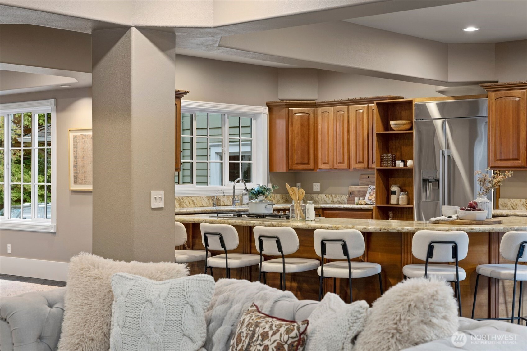 1147 Federal Avenue East Seattle, WA 98102 - Photo 10 of 40 a kitchen with stainless steel appliances granite countertop a stove a sink dishwasher and cabinets with wooden floor