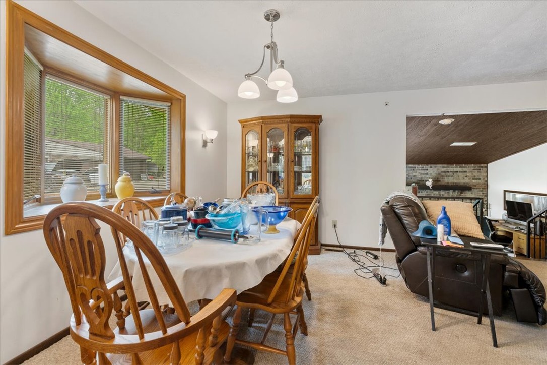 7225 Garber Road Clayton, OH 45415 - Photo 22 of 33 This cozy dining area features a large bay window, perfect for enjoying natural light.