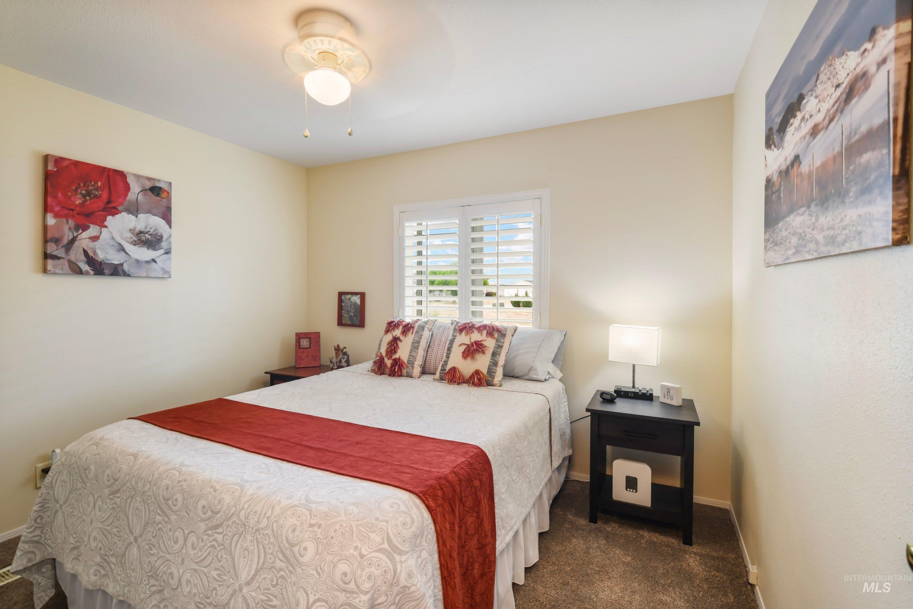421 South Curtis Road, Unit 202 202 Boise, ID 83705 - Photo 17 of 41 Carpeted bedroom with a vaulted ceiling and overhead lighting