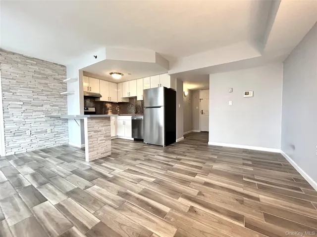 a view of a kitchen with a sink