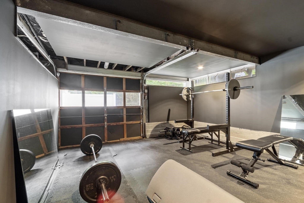 167 Gates Pond Road Berlin, MA 01503 - Photo 30 of 32 a view of a room with gym equipment