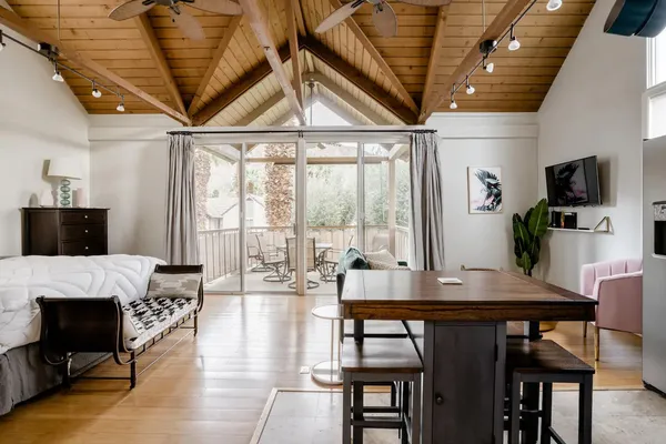 a very nice looking living room with a large window