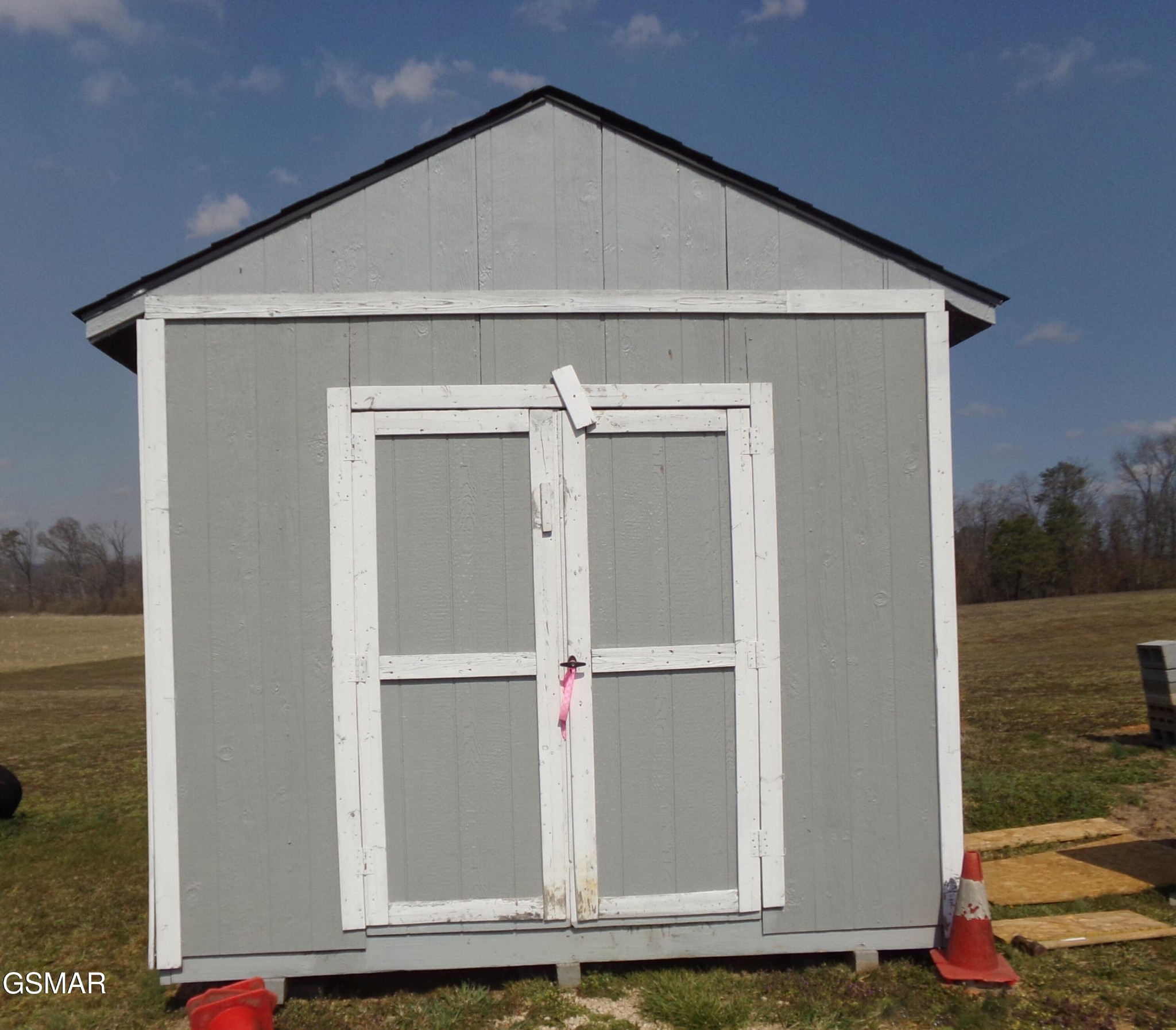 1165 Ballplay Road Madisonville, TN 37354 - Photo 26 of 34 a front view of a house with lake