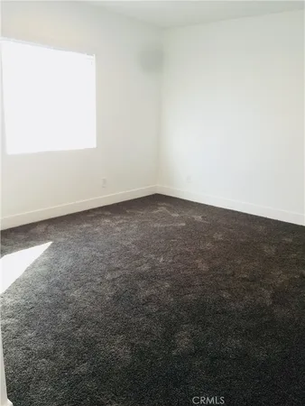 a bathroom with a toilet a sink and a shower