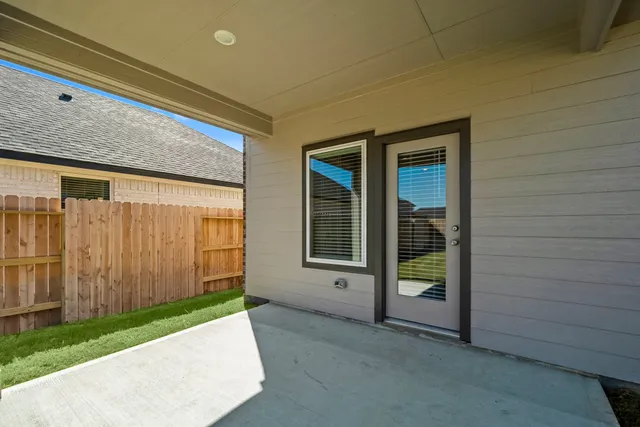 a view of backyard with cabin