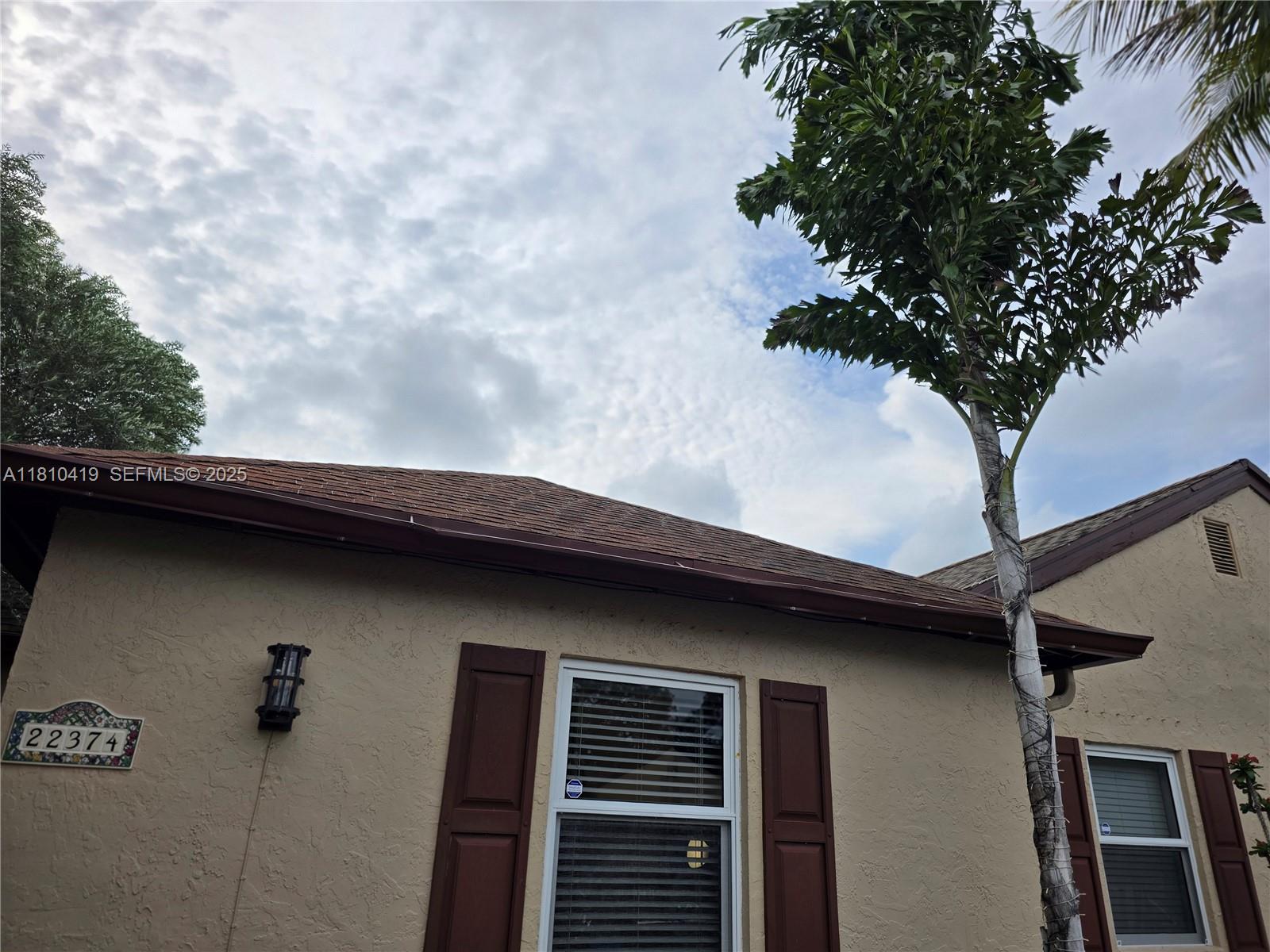 22374 Southwest 57th Circle Boca Raton, FL 33428 - Photo 2 of 31 a backyard of a house