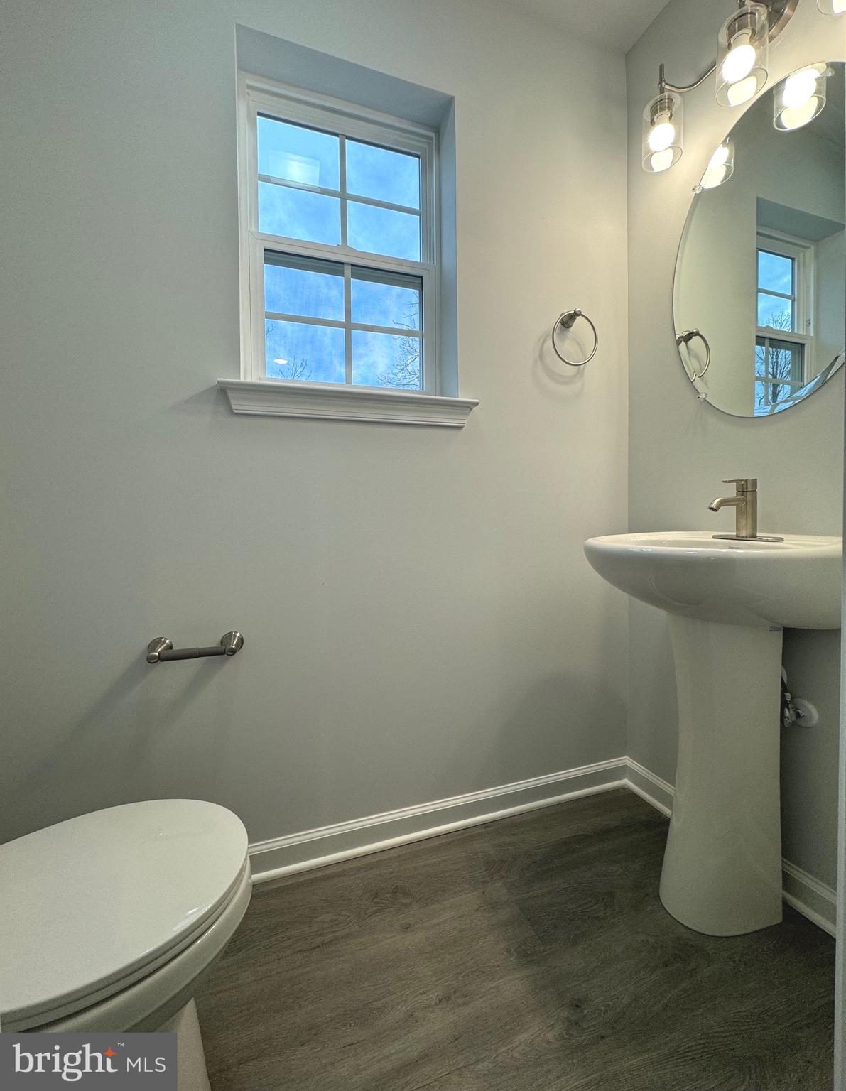 113 Henry Street Bridgeton, NJ 08302 - Photo 12 of 24 a bathroom with a sink toilet and a mirror